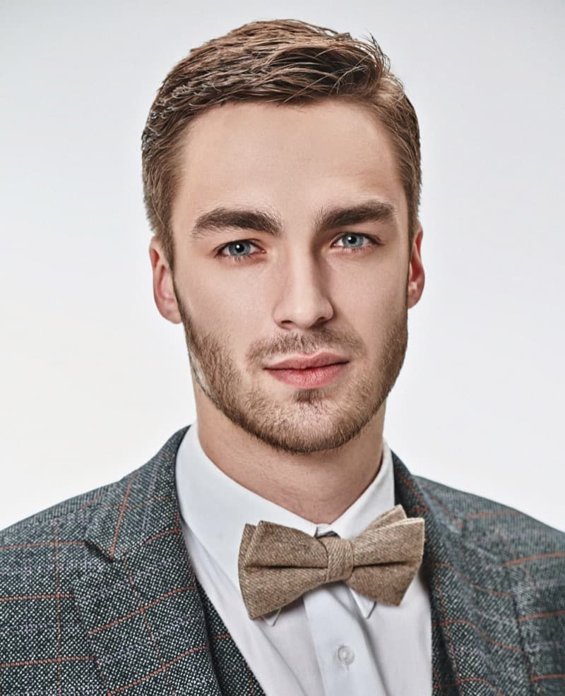 Professional men's haircut suitable for executives considering subtle SMP in Queens NYC