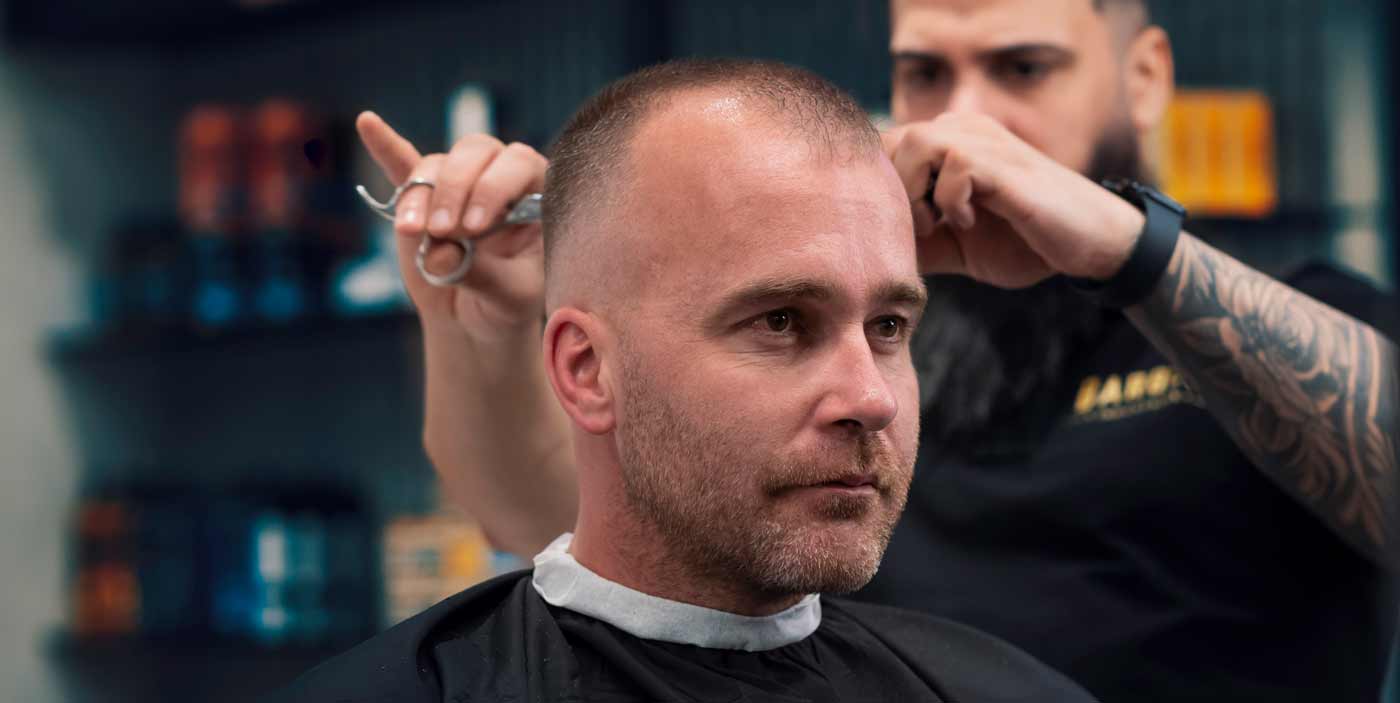 Professional haircuts for men with thinning hair at Therapeutic Cuts barbershop in Queens NYC