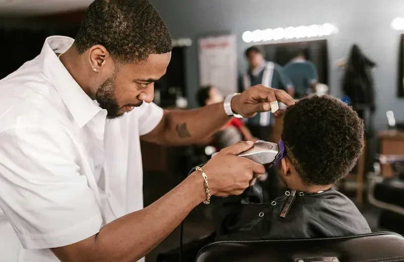 Best Haircuts for Square Face Men in Queens, NYC — Therapeutic Cuts Face Shape Haircuts guide card image