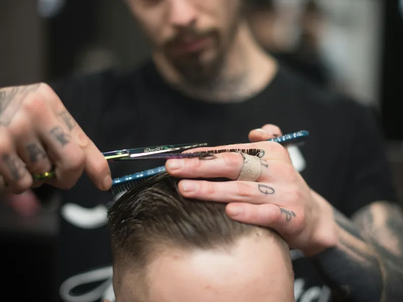 Precision scissor haircut adding controlled texture for diamond face men