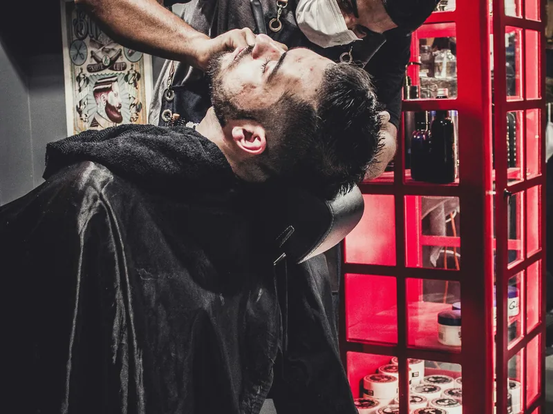 Haircut and beard grooming service at a Queens barbershop