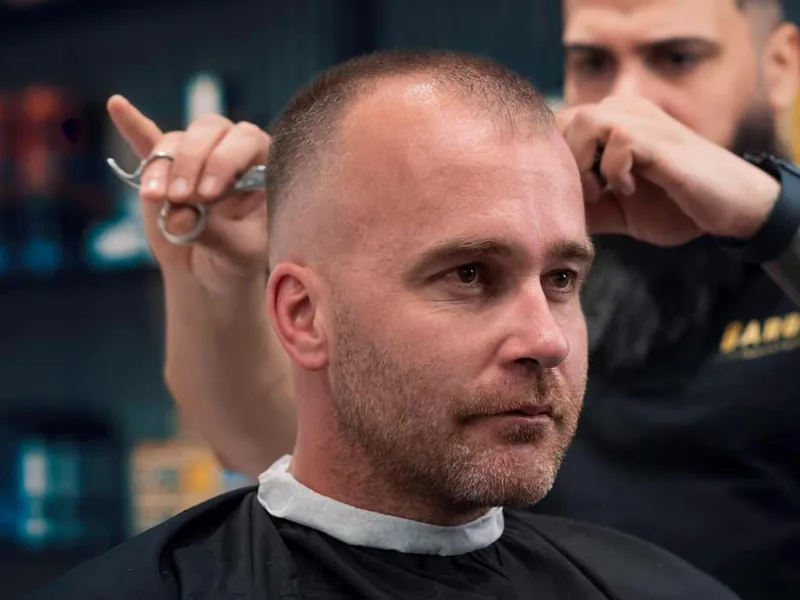 Men’s haircut for thinning hair at a Queens barbershop